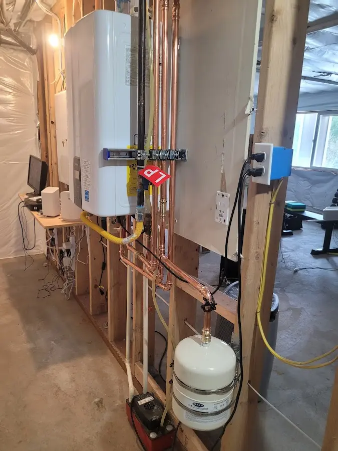 Licensed plumber repairing a kitchen sink in Waikapu